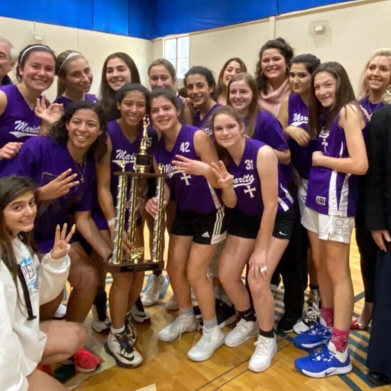 Women's basketball team winning 1st place at the 2019 Winter Youth Rally